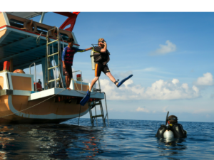 Taking the "big step" off the boat and into the waters of Koh Tao