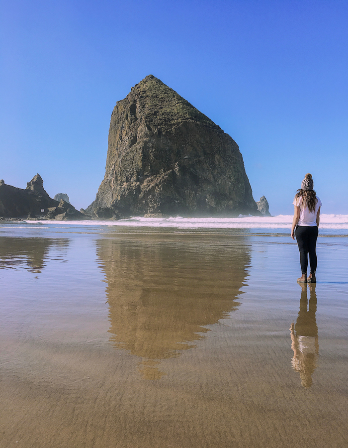 The famous Haystack Rock on Cannon Beach, and it's reflection