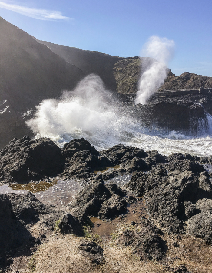 Spouting Horn blowing mist into the air, just off the Oregon Coast Highway