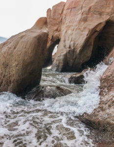 A wave crashing on the rocks at Cape Kiwanda Natural Area