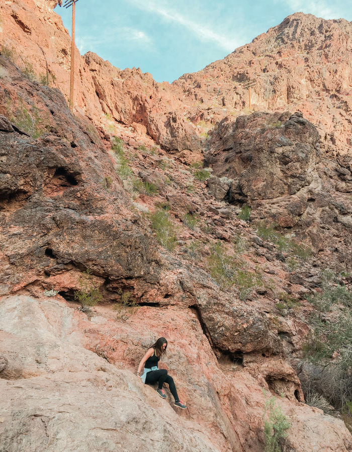 Climbing down some precarious rocks on the trail to Gold Strike Hot Spring