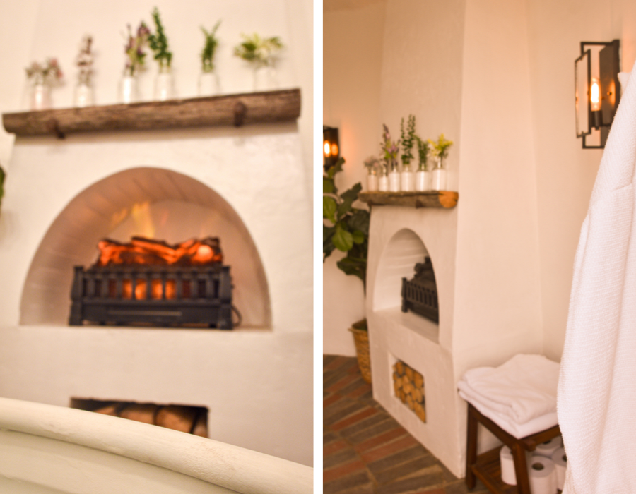 The faux fireplace, robes, towels, and circular bath tub.