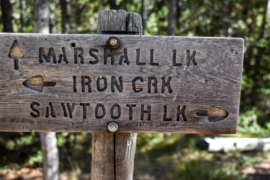 Trail sign for Sawtooth Lake (and Alpine Lake scratched into the bottom by a hiker)