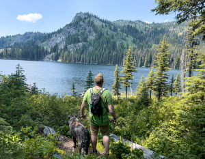 Francis hiking with our dog Tuna